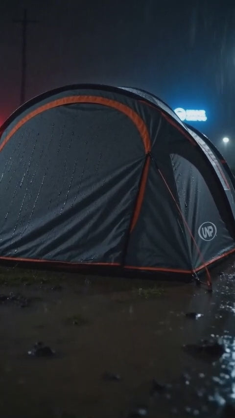 UNP waterproof camping tent standing strong in heavy rain at night, durable all-weather dome tent